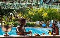 Enjoy a cocktail at the pool bar