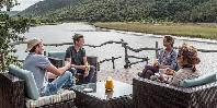 Deck overhanging river