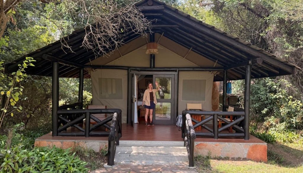 Liz standing in front of the family tent at Samburu Intrepids camp in Kenya